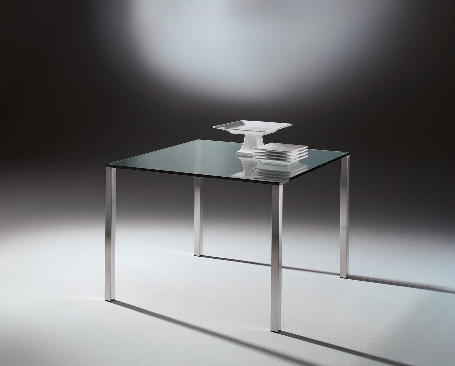 Glass table QUADRO by DREIECK DESIGN: Q 1172 - FLOATGLASS clear + table feet stainless steel brushed