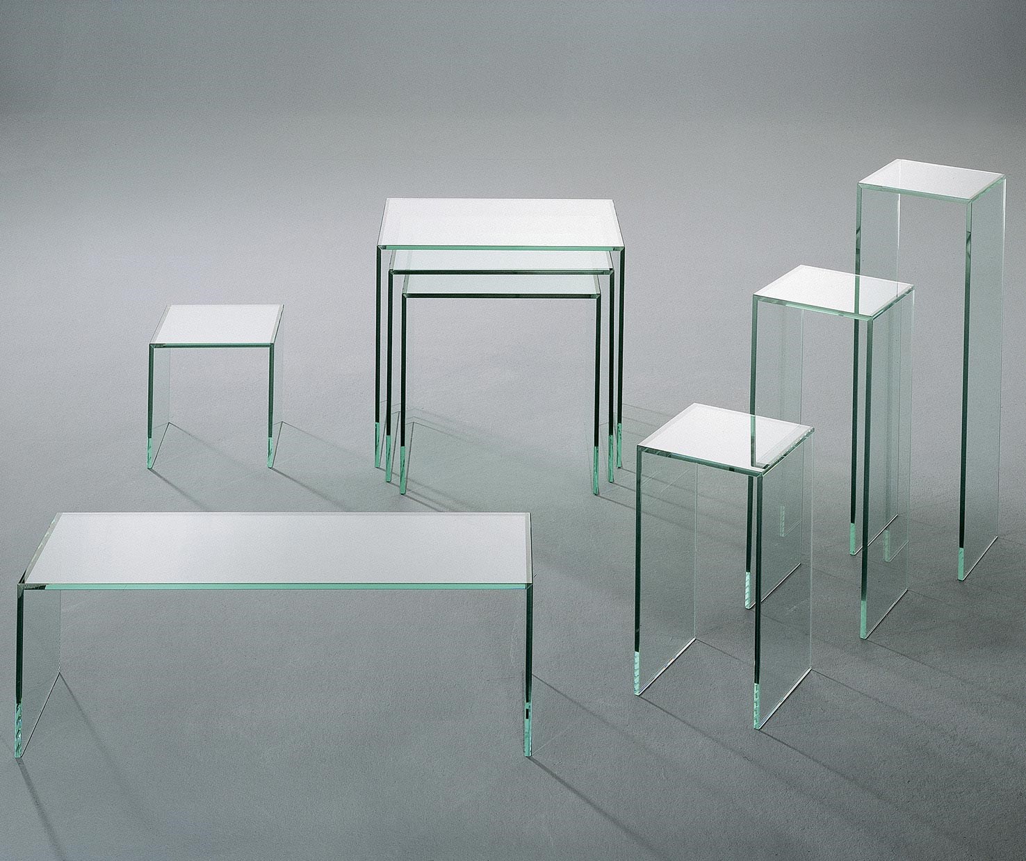 Glass nesting tables by DREIECK DESIGN: SL07-1 + SL07-2 + ST08-1 + ST08-2 + ST08-3 + SL04-1 + SL04-2 + SL04-3 - all in FLOATGLASS