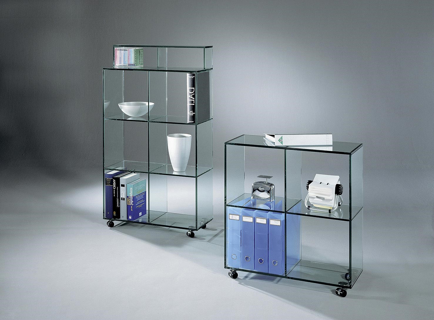 Glass shelf on wheels BOOKLINE by DREIECK DESIGN: BL 23 (incl. optional extension) + BL 22 - FLOATGLASS