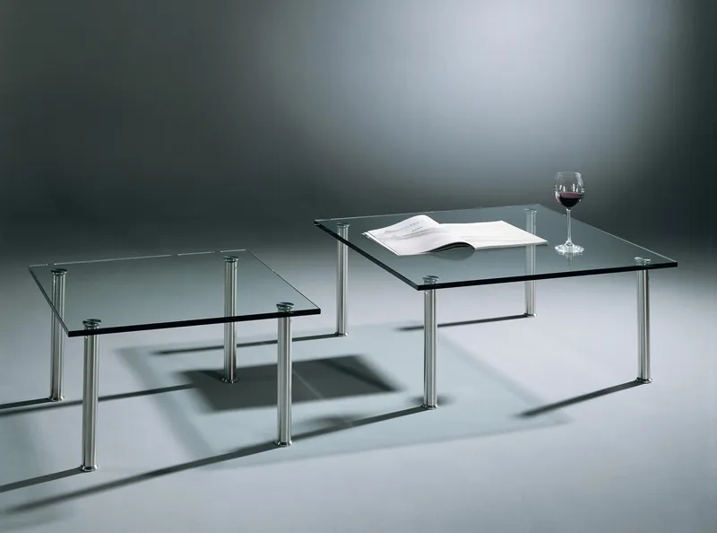 SIRIUS S 7740 and S 9940 square glass coffee tables by DREIECK DESIGN · Clear Floatglas · Brushed stainless steel legs