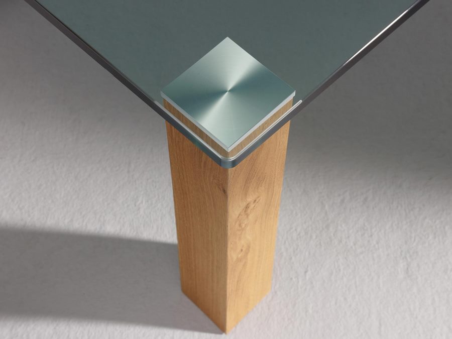 Rounded glass corner and wild oak-veneered foot on REMUS