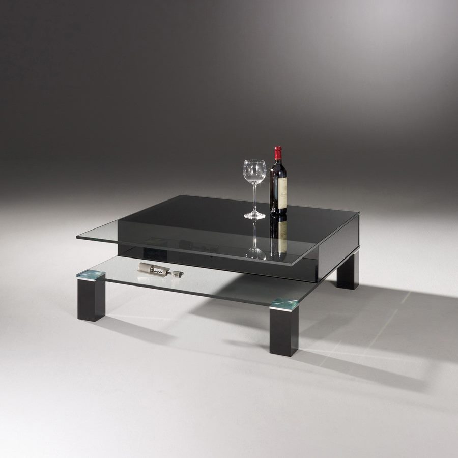 THEBEN with a clear glass top and a jet black drawer section