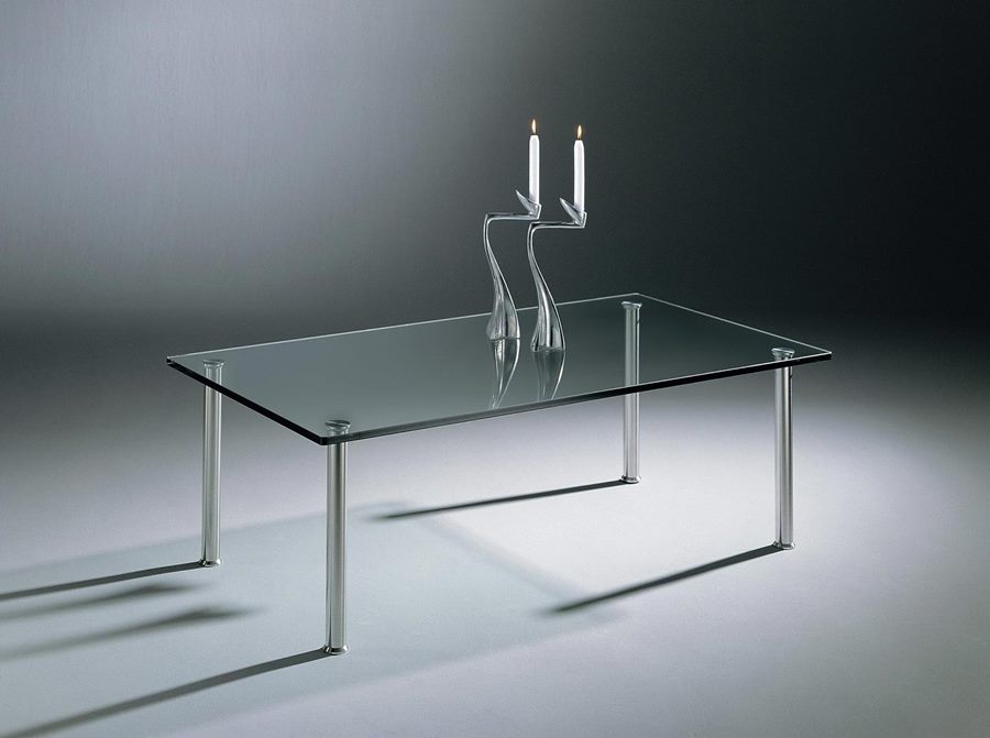 Rectangular SIRIUS glass coffee table shown with stainless steel legs