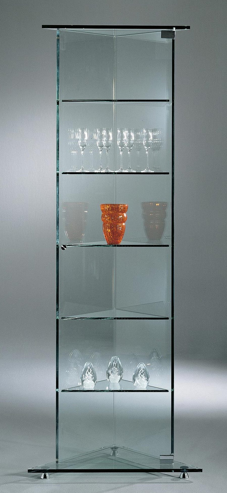 CASTEL corner glass display cabinet with a triangular footprint