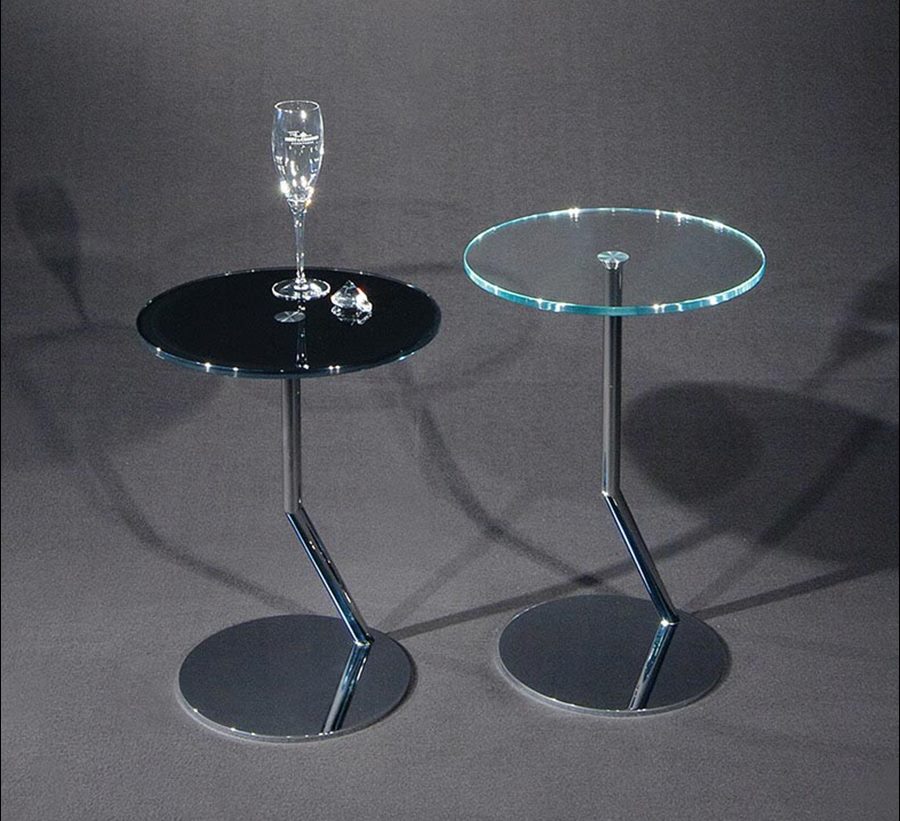 DISC with a black round top beside a clear version